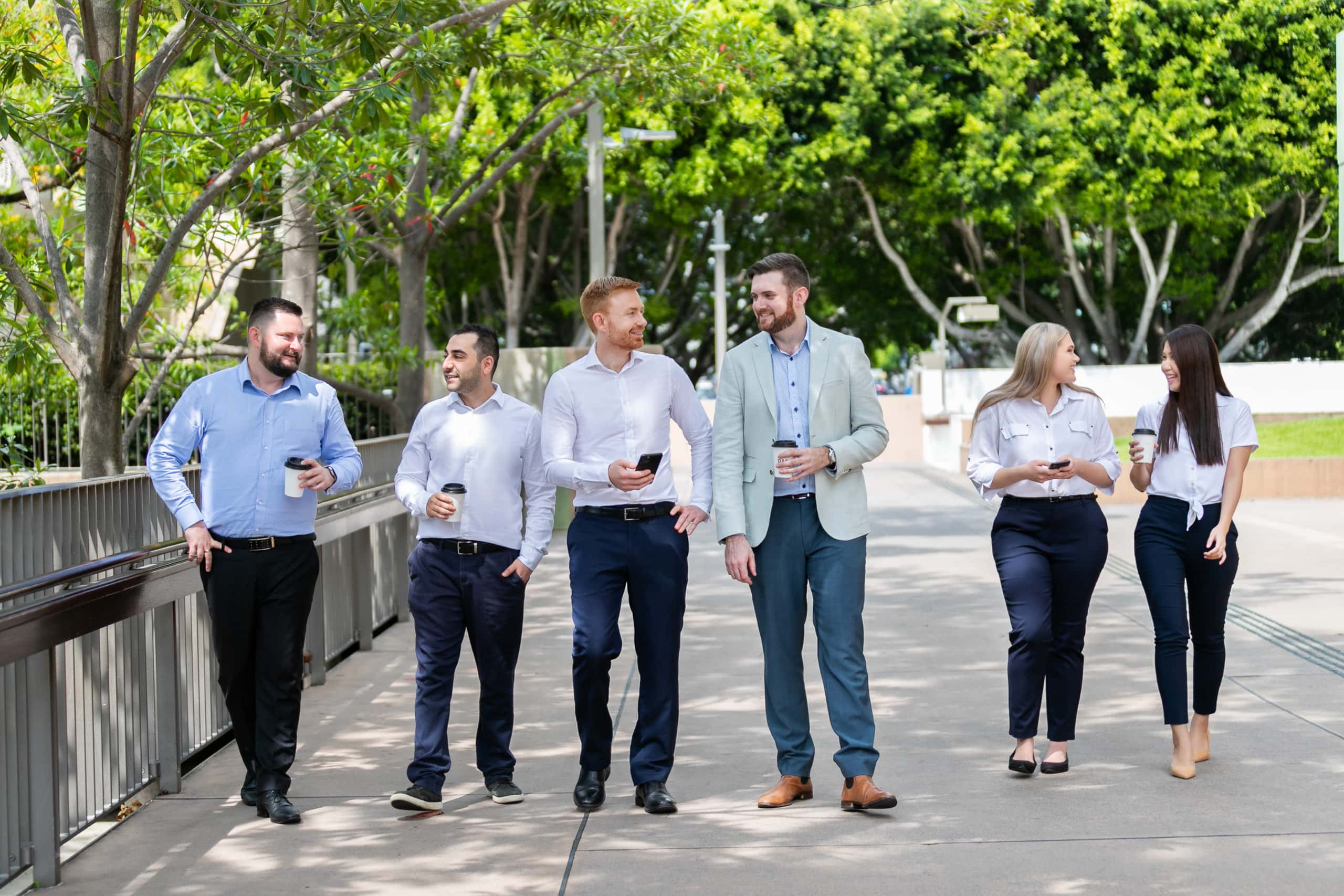 IT Employees Walking on a Street View