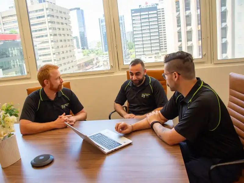 Essential Tech team discussing a client roadmap